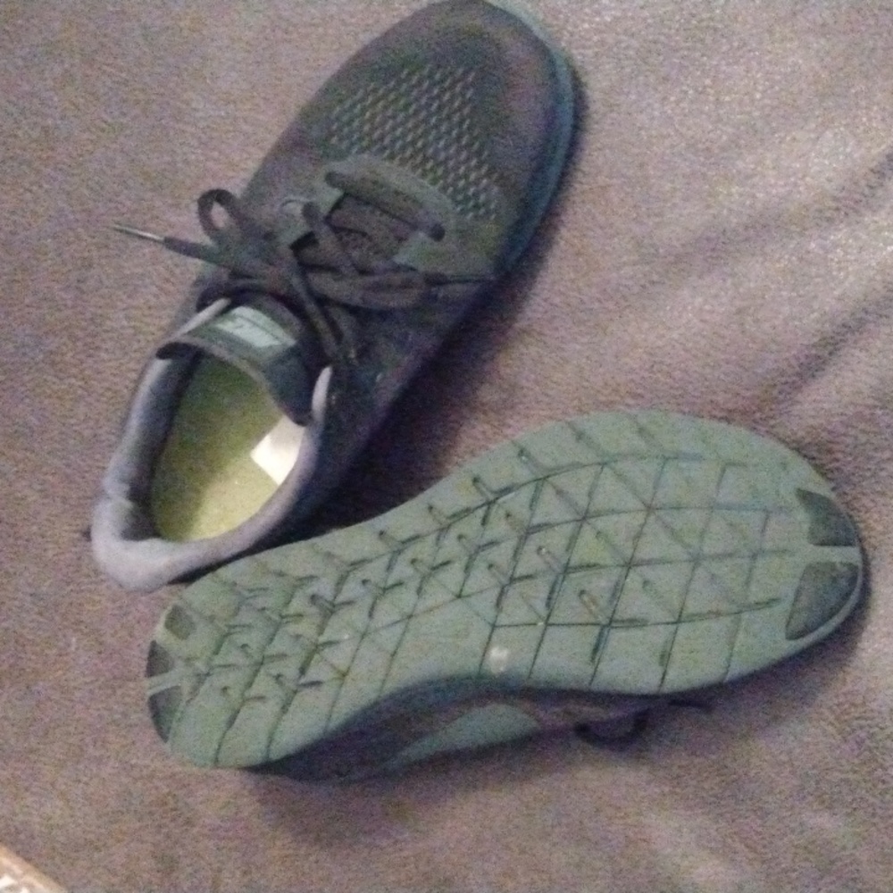 All black Nike sneakers
